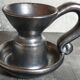 1950s iridescent black ceramic hand candle holder