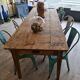 Large antique farmhouse table with a drawer