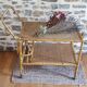 Serving table in rattan