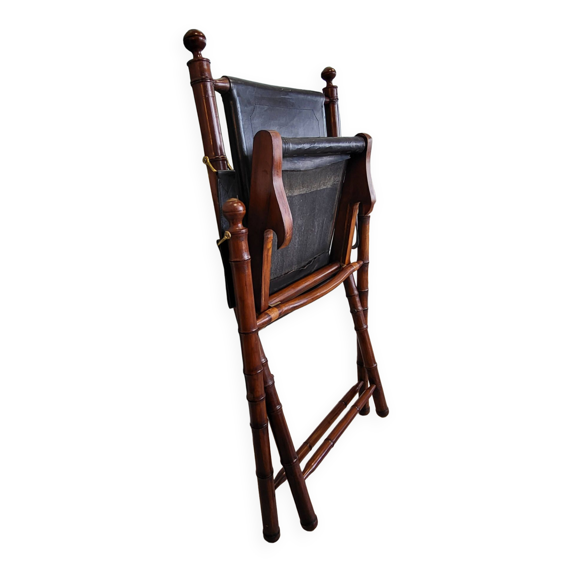 Colonial style folding leather and teak armchair