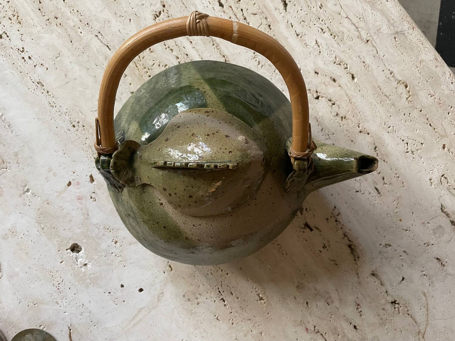 Handmade ceramic teapot with green fish and bamboo