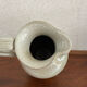 Lot pitchers in real sandstone