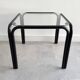 Vintage square black side table with a glass top