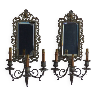Pair of wall lights, bronze, with mirror plate.