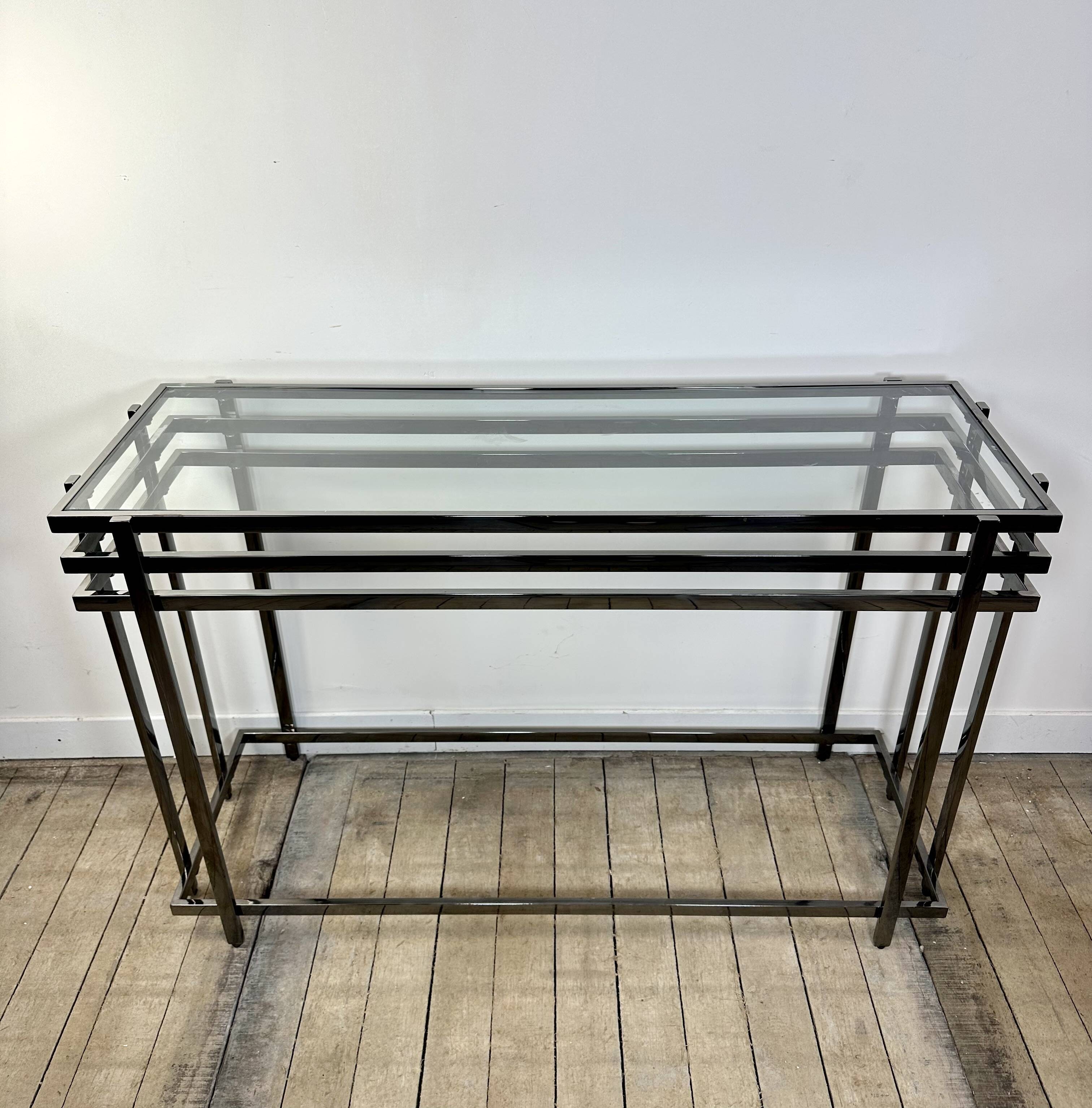 Smoked silver metal console from the 2000s.