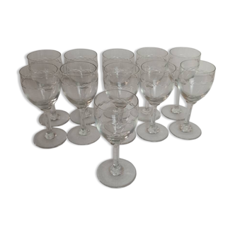 Set of 11 antique engraved crystal liqueur glasses.