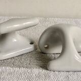 Pair of white porcelain hooks