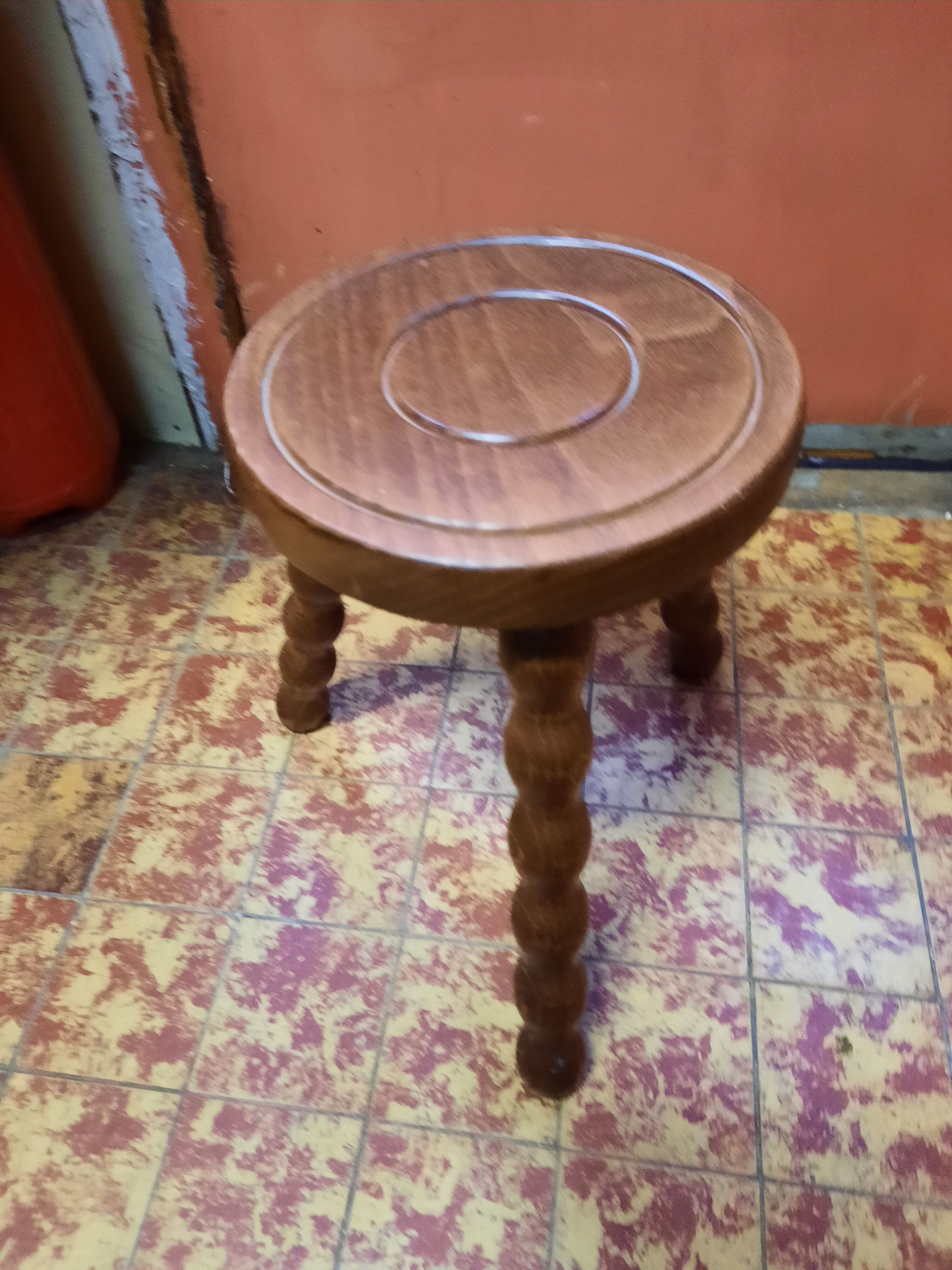 Wooden tripod stool