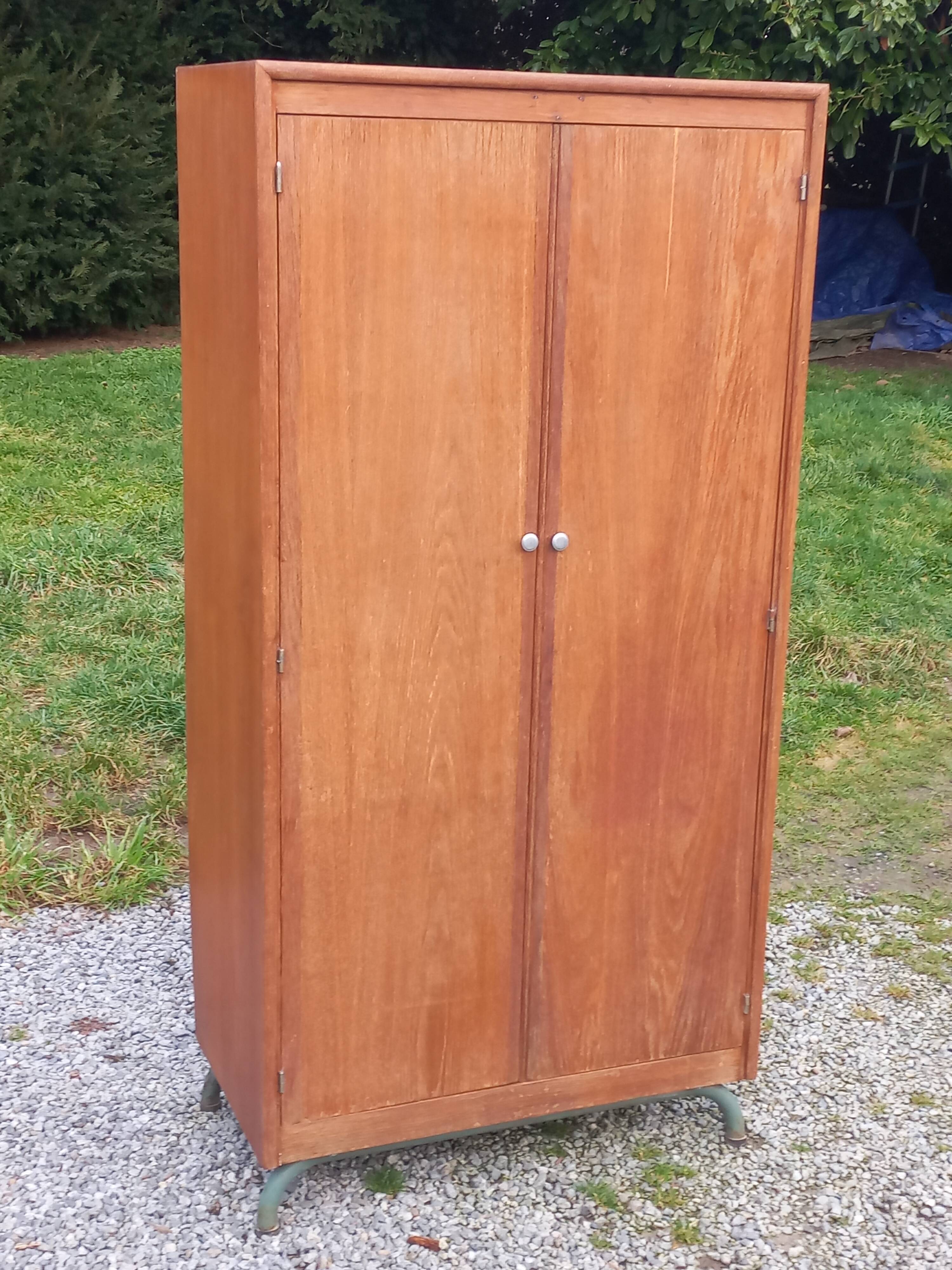 Vintage oak wardrobe with metal legs from the 1950s.