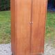 Vintage oak wardrobe with metal legs from the 1950s.
