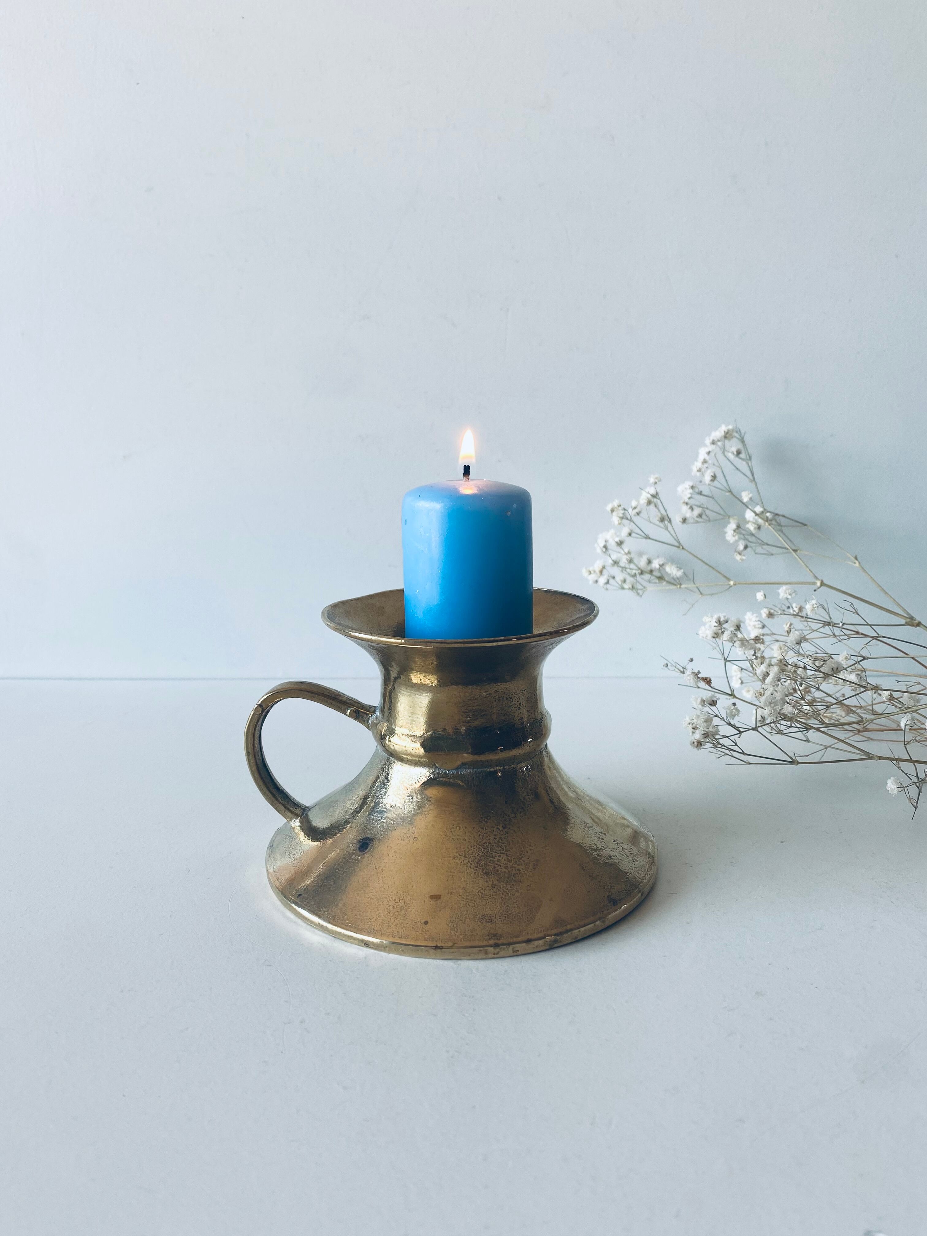Old bronze church candle holder