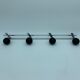 Coat holder 4 chrome steel pateres and black wooden balls