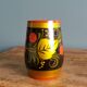 Khokhloma vase, Russian lacquered wood craftsmanship, hand-painted decoration.