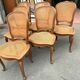 Suite de six chaises de style Régence en chêne massif XX siècle