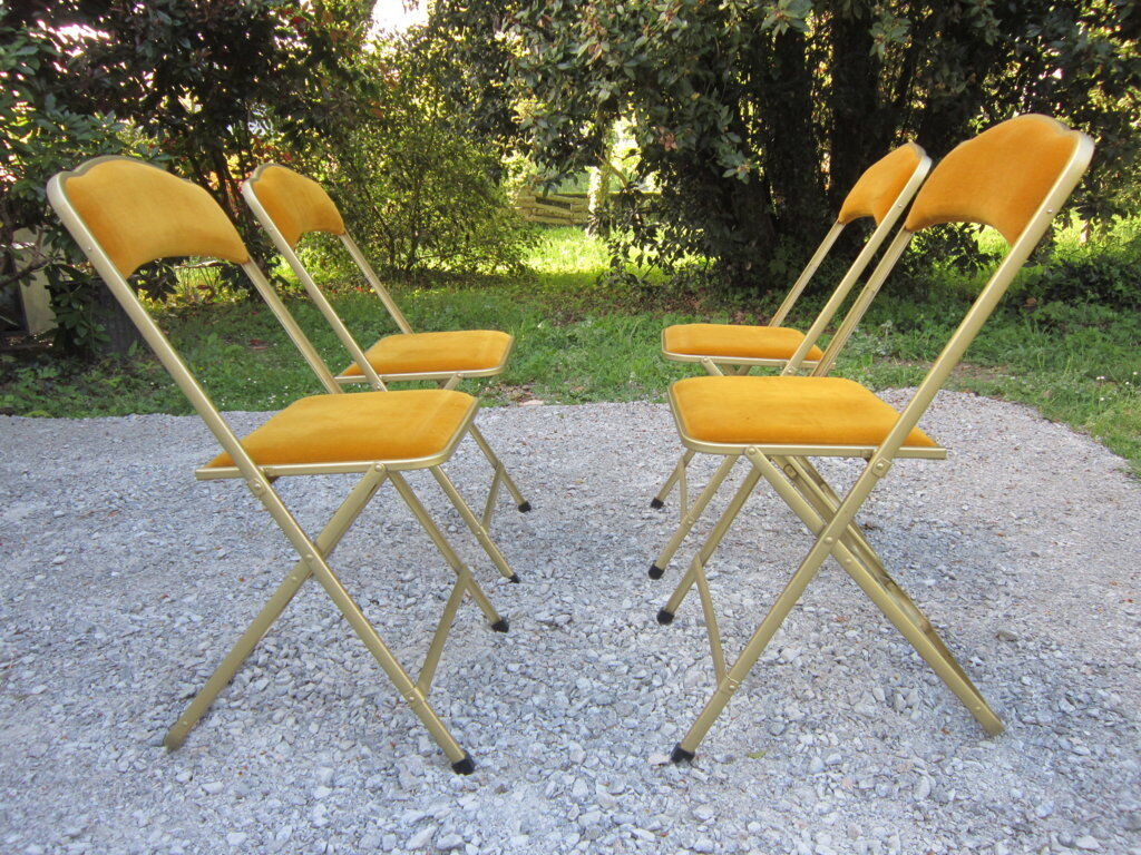 Série de 4 chaises pliantes métal doré et tissus