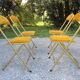 Série de 4 chaises pliantes métal doré et tissus