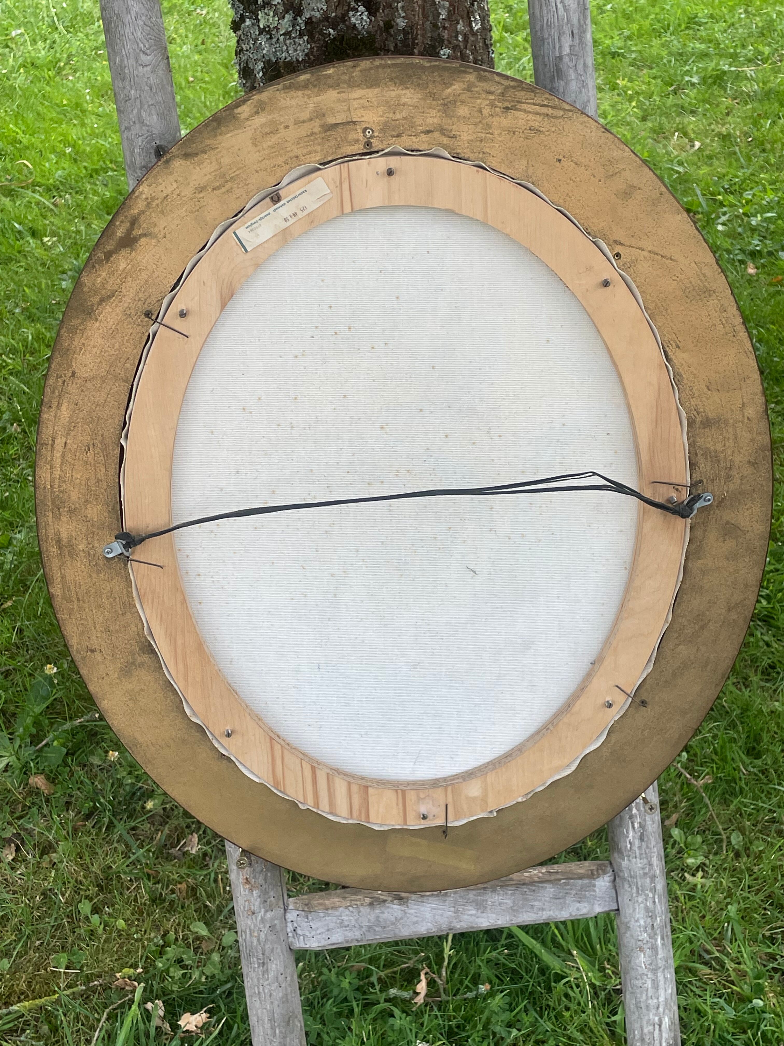 Set of 2 medallion frames in molded wood and canvas