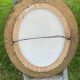 Set of 2 medallion frames in molded wood and canvas
