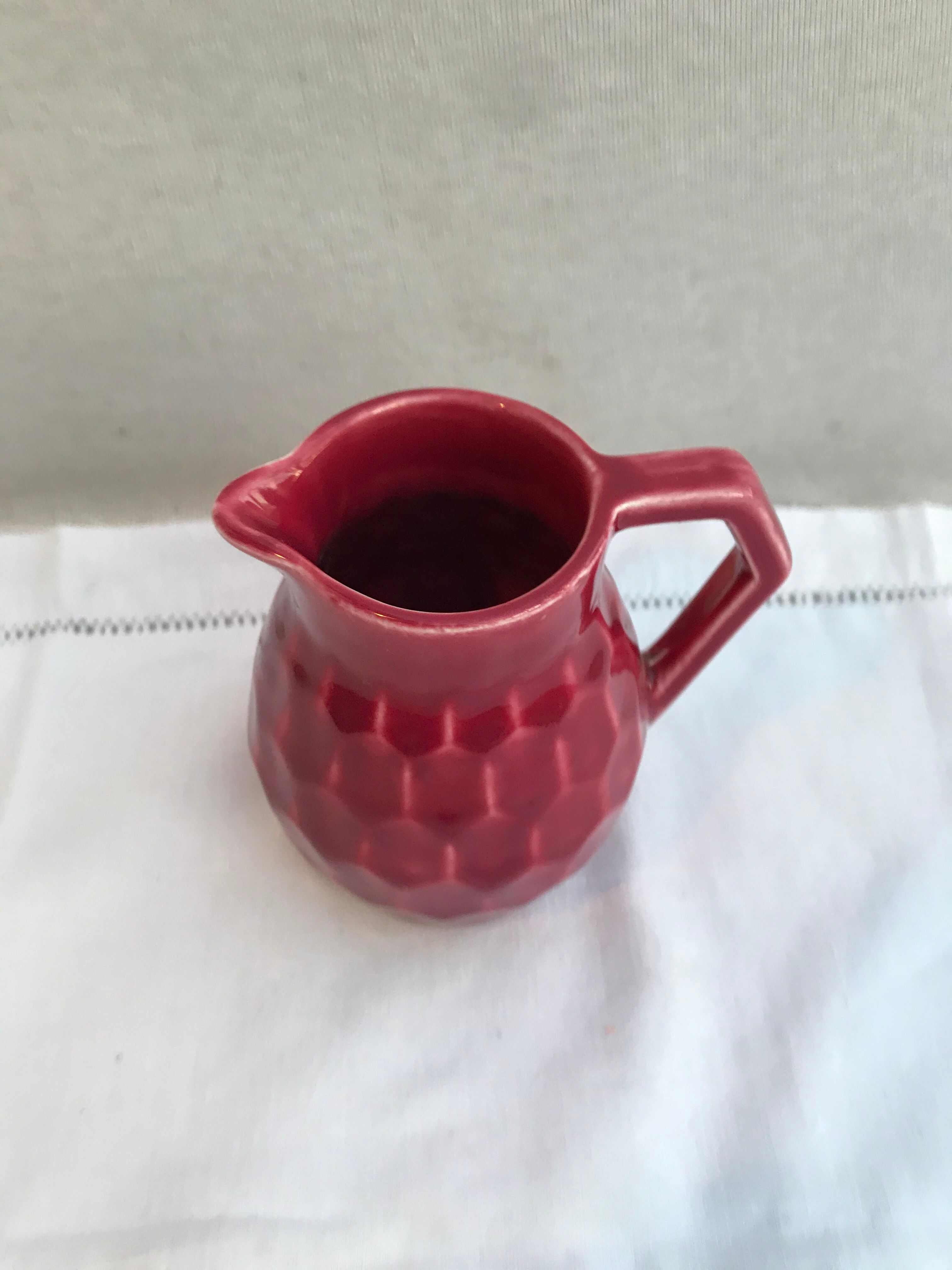Former art deco red ceramics pitcher