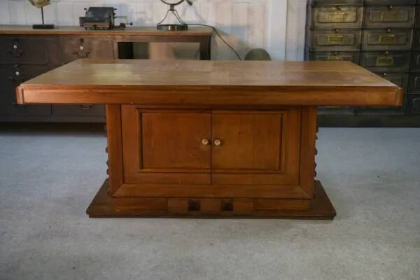 Solid oak table with central pedestal base and storage, Charles Dudouyt, 1950s
