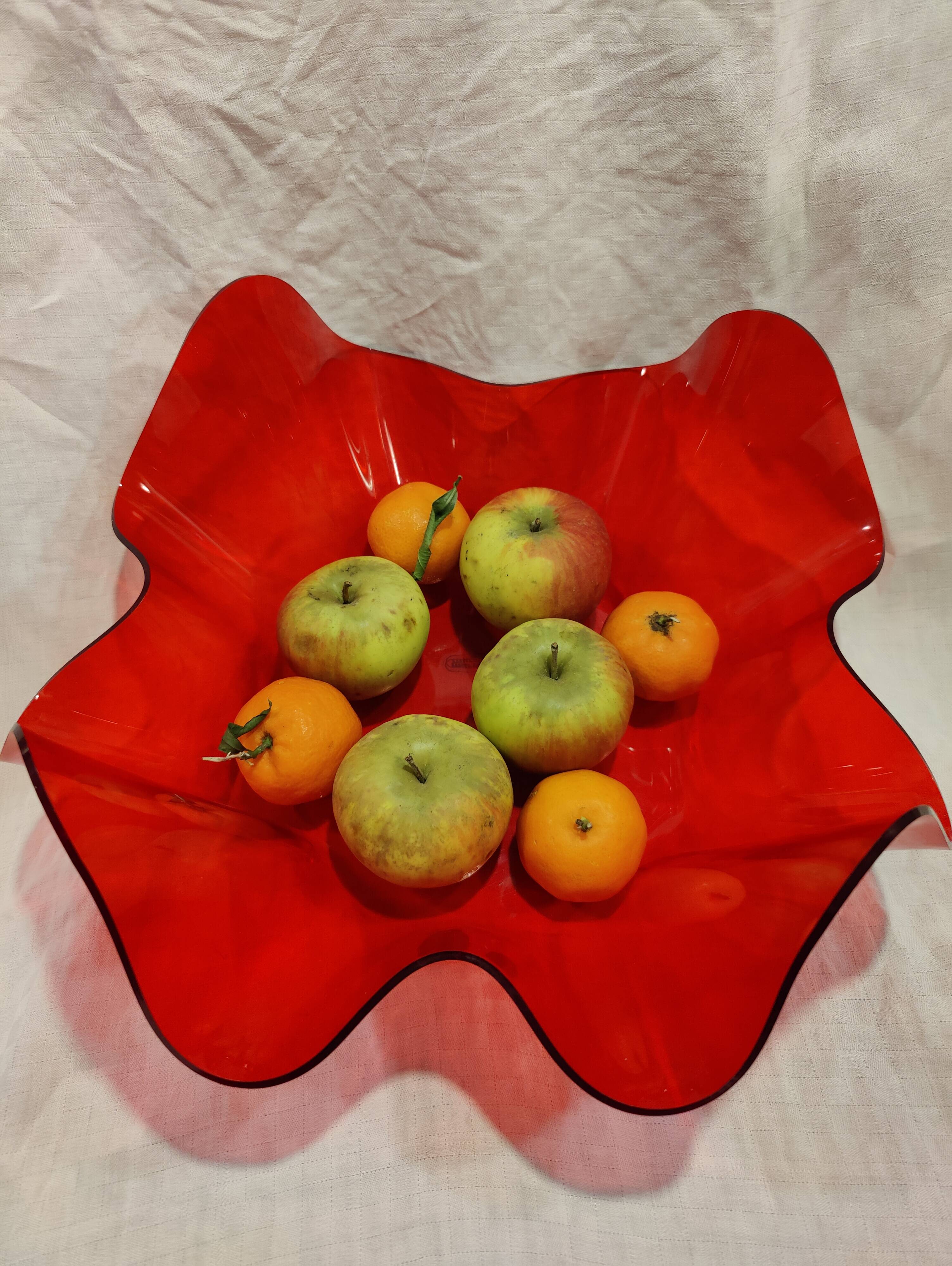 Red plexiglass fruit basket from the 70s