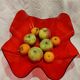 Red plexiglass fruit basket from the 70s
