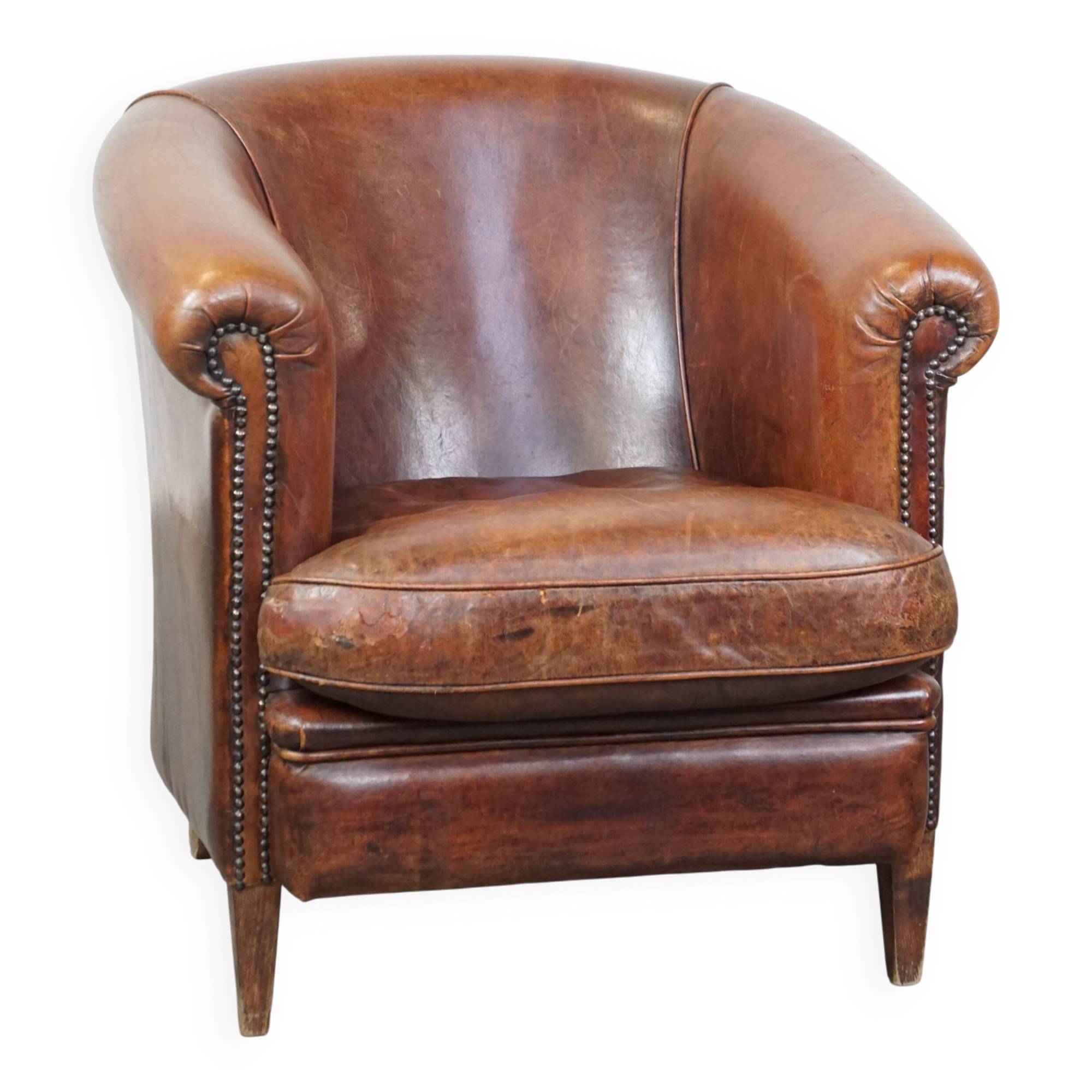 Cognac-colored sheepskin leather club chair