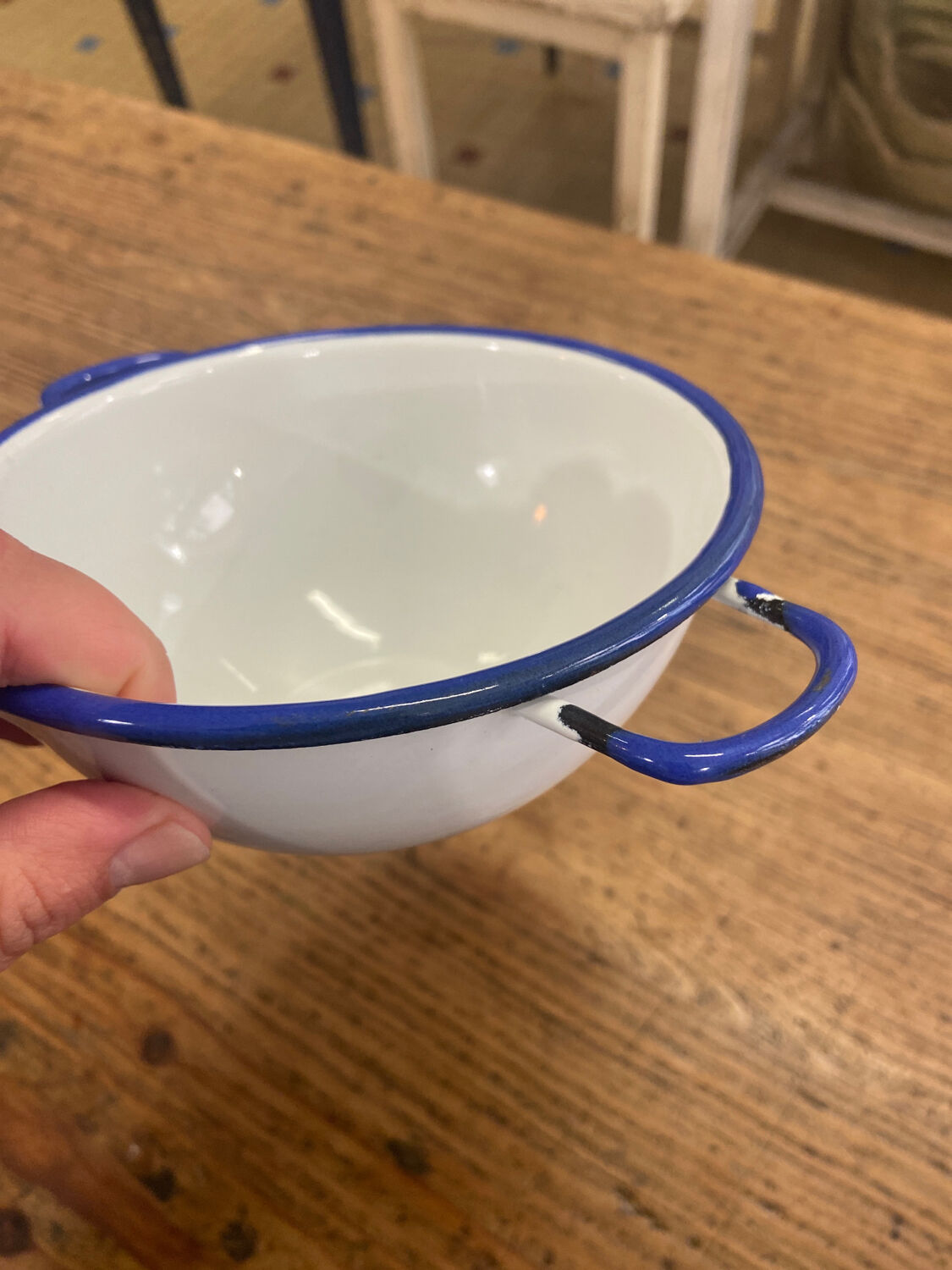 White enamel bowl and blue border