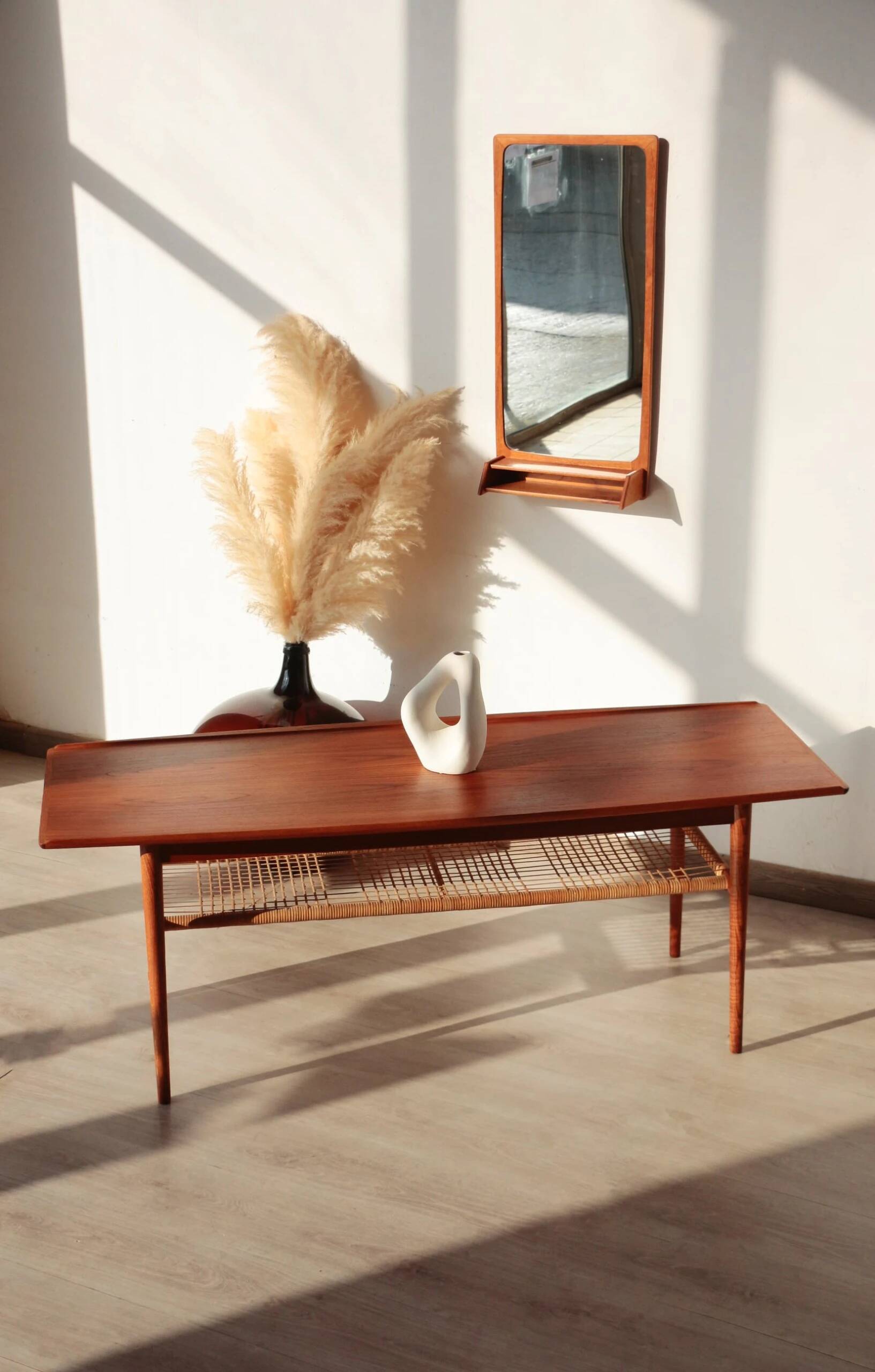 Vintage Scandinavian coffee table in teak and rattan – Danish design from the 1960s.