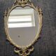 Louis XV style mirror in brass