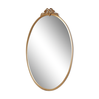 Oval mirror in gilded metal louis XVI style