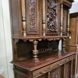 Important two-body buffet in solid walnut, richly carved in pure Renaissance style.