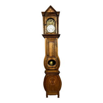 Empire period clock in walnut and light wood marquetry