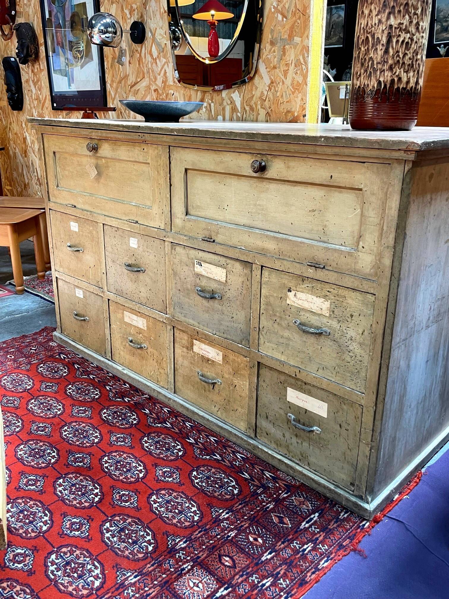 Old workshop furniture in good condition. 8 drawers and 2 drop-down doors, very