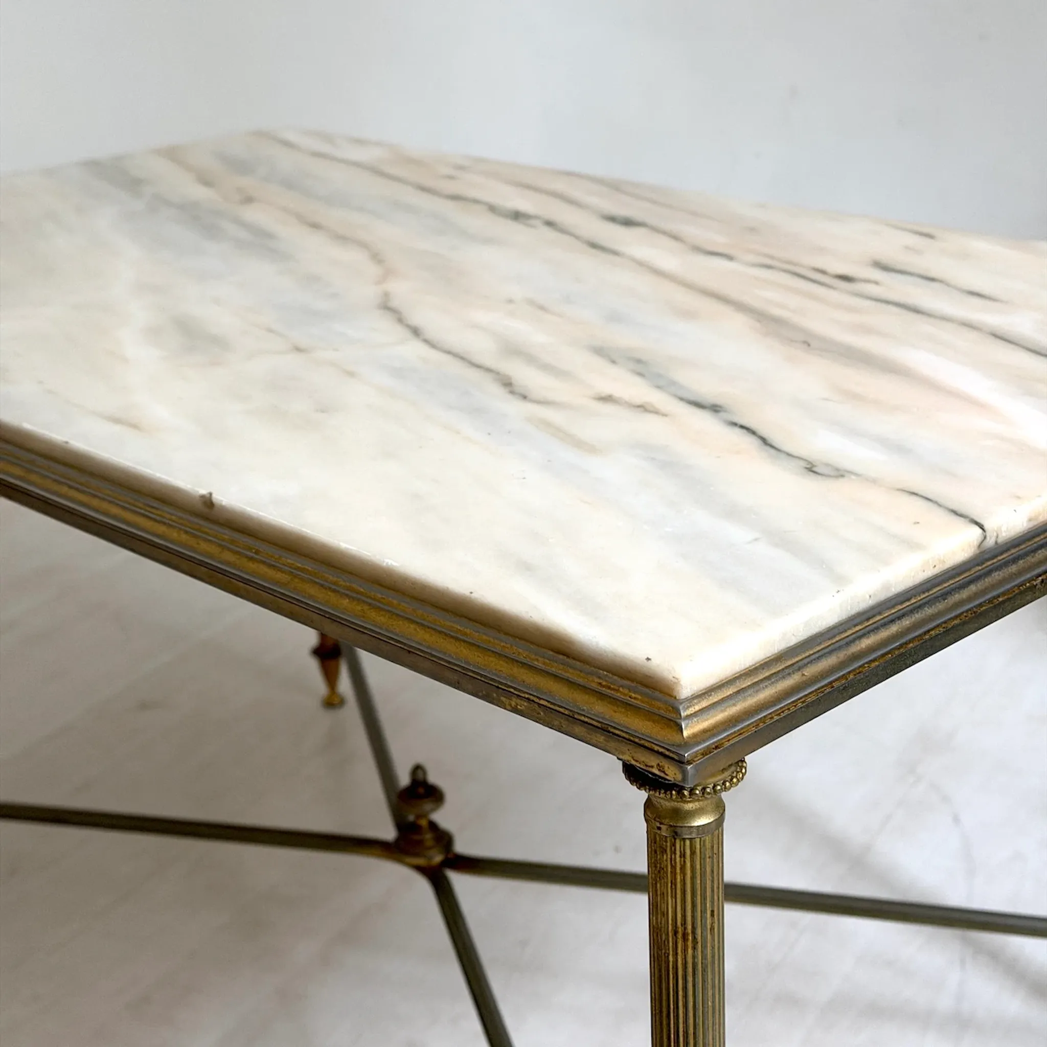 Vintage coffee table in 1970s neoclassical style.