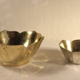 Two brass trundle cups