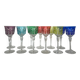 Set of twelve glasses in crystal tinted in different colours and cut with stars.