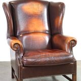 Beautiful classic and stately wingback armchair made of sheep leather with beautiful colors