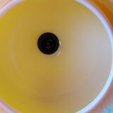 Suspension in orange opaline