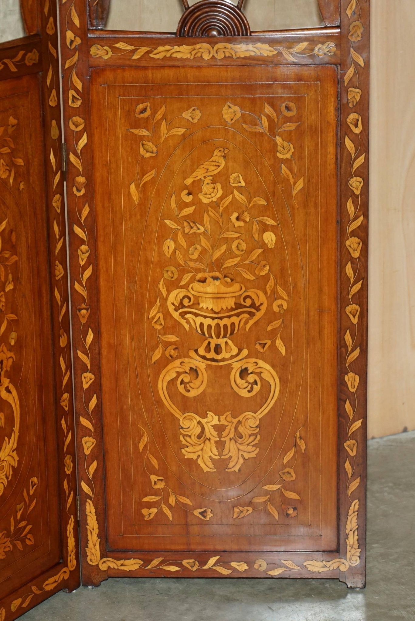 Pair of three-panel screens made of Dutch hardwood and walnut.