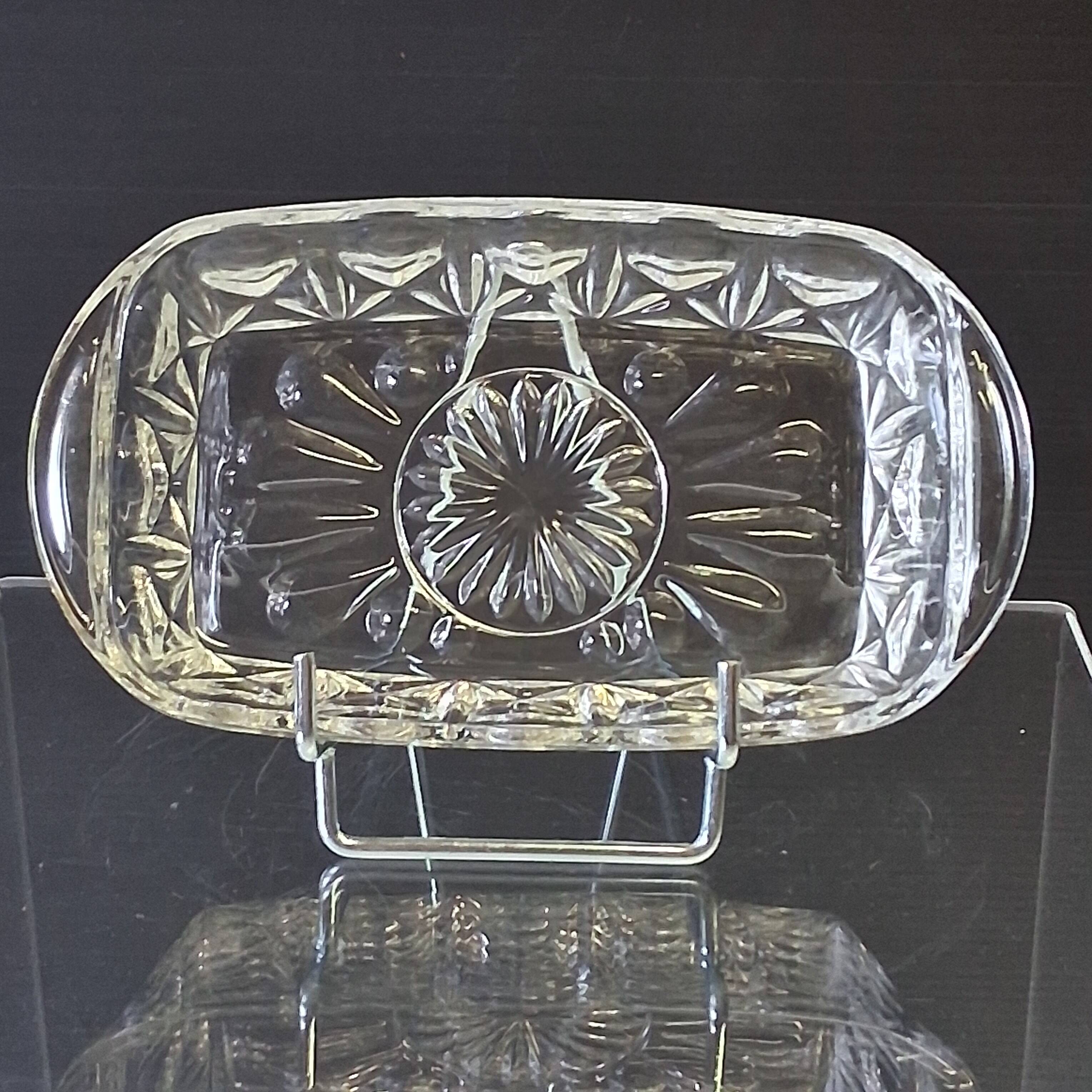 2 transparent glass ramekins with handles in very good condition.