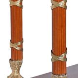 Console topped with an Empire-style mirror.