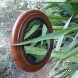 Old wooden round mirror