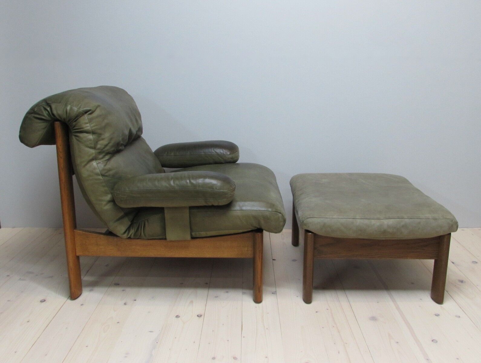 Armchair and footstool - green leather - 1960s