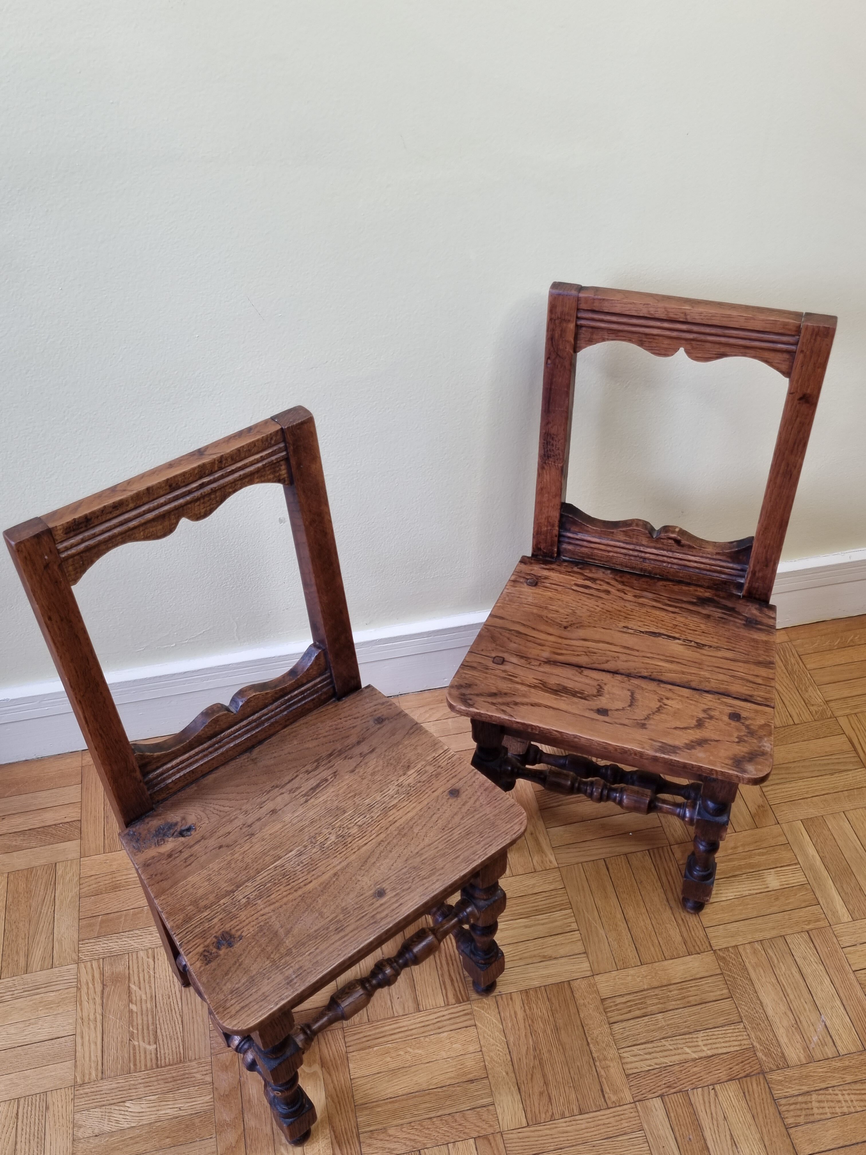 Pair of old children's chairs made of solid wood