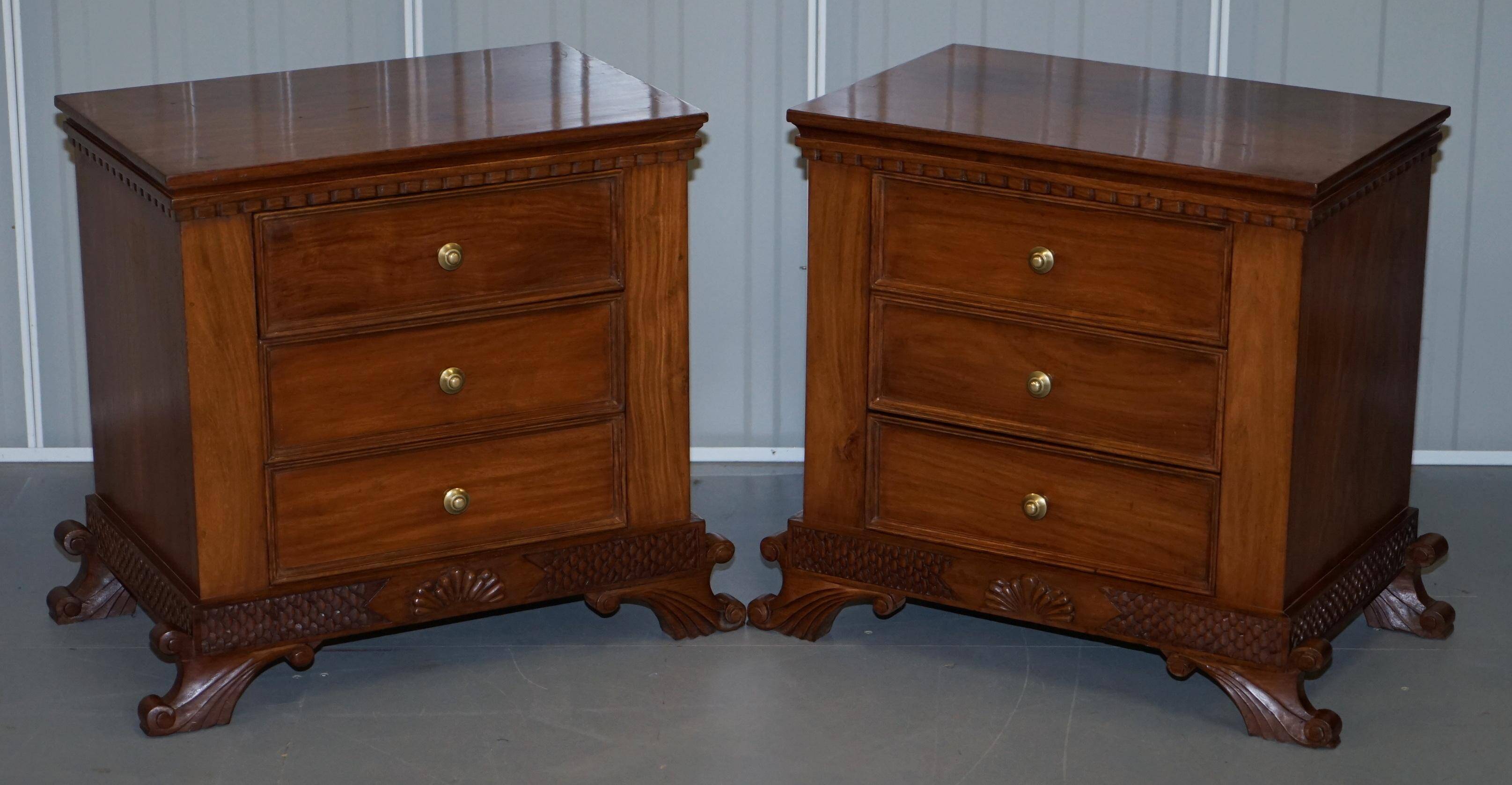 Set of hardwood dressers with finely carved bases.