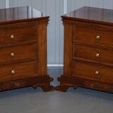 Set of hardwood dressers with finely carved bases.
