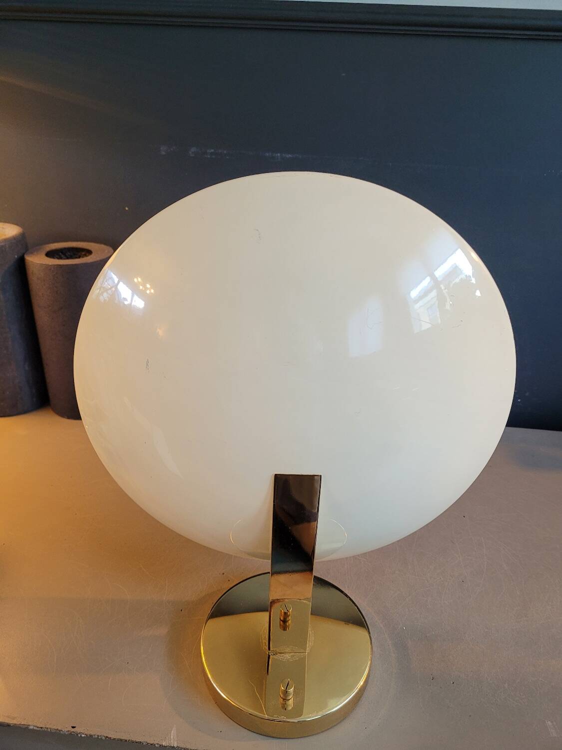 Gold and cream white saucer wall sconce