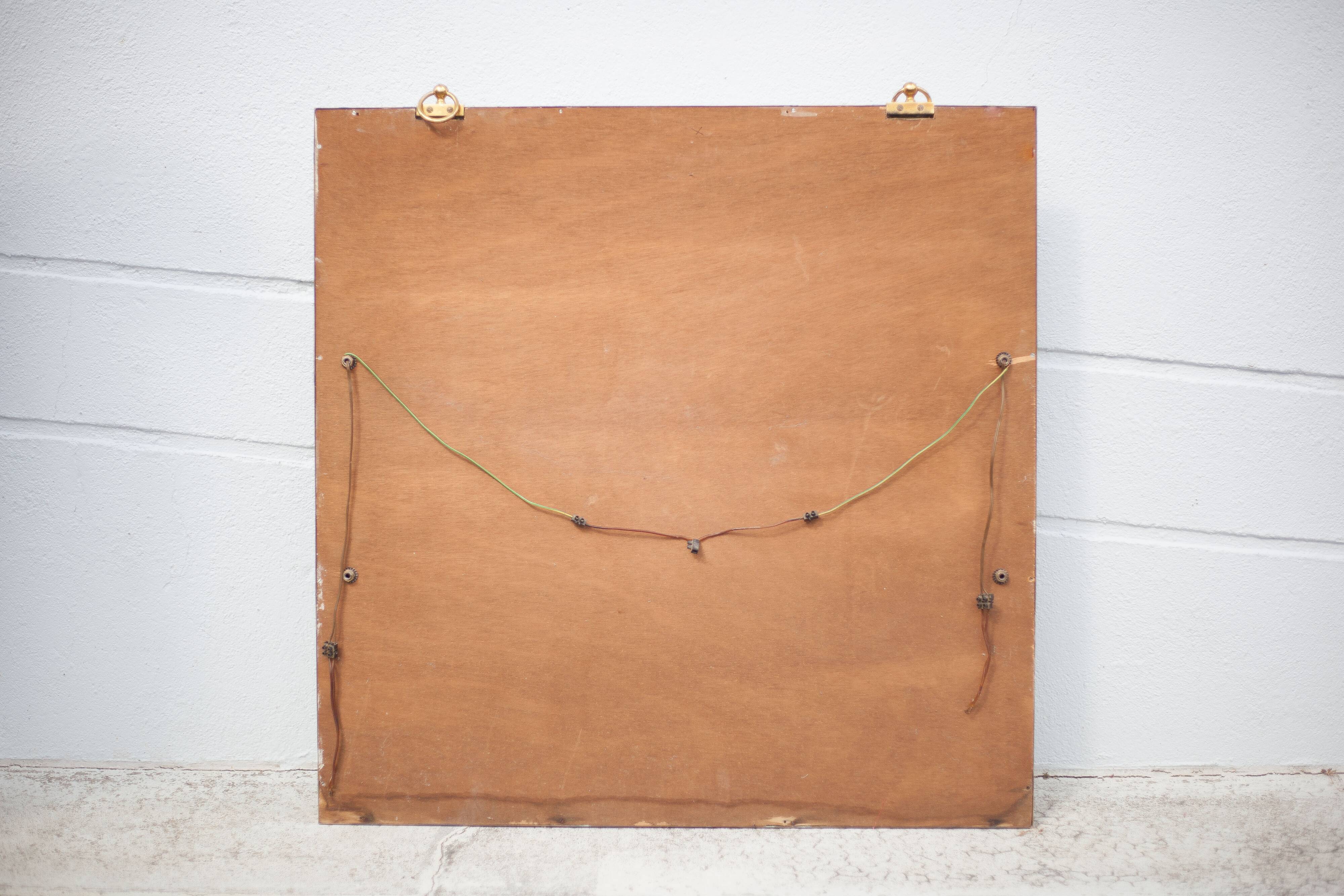 mirror with articulated wall light