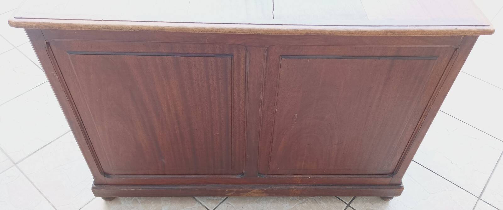 Vintage double-sided mahogany desk with 18 drawers.